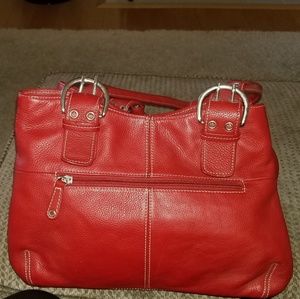 Like new red Tiganello leather purse and wallet.